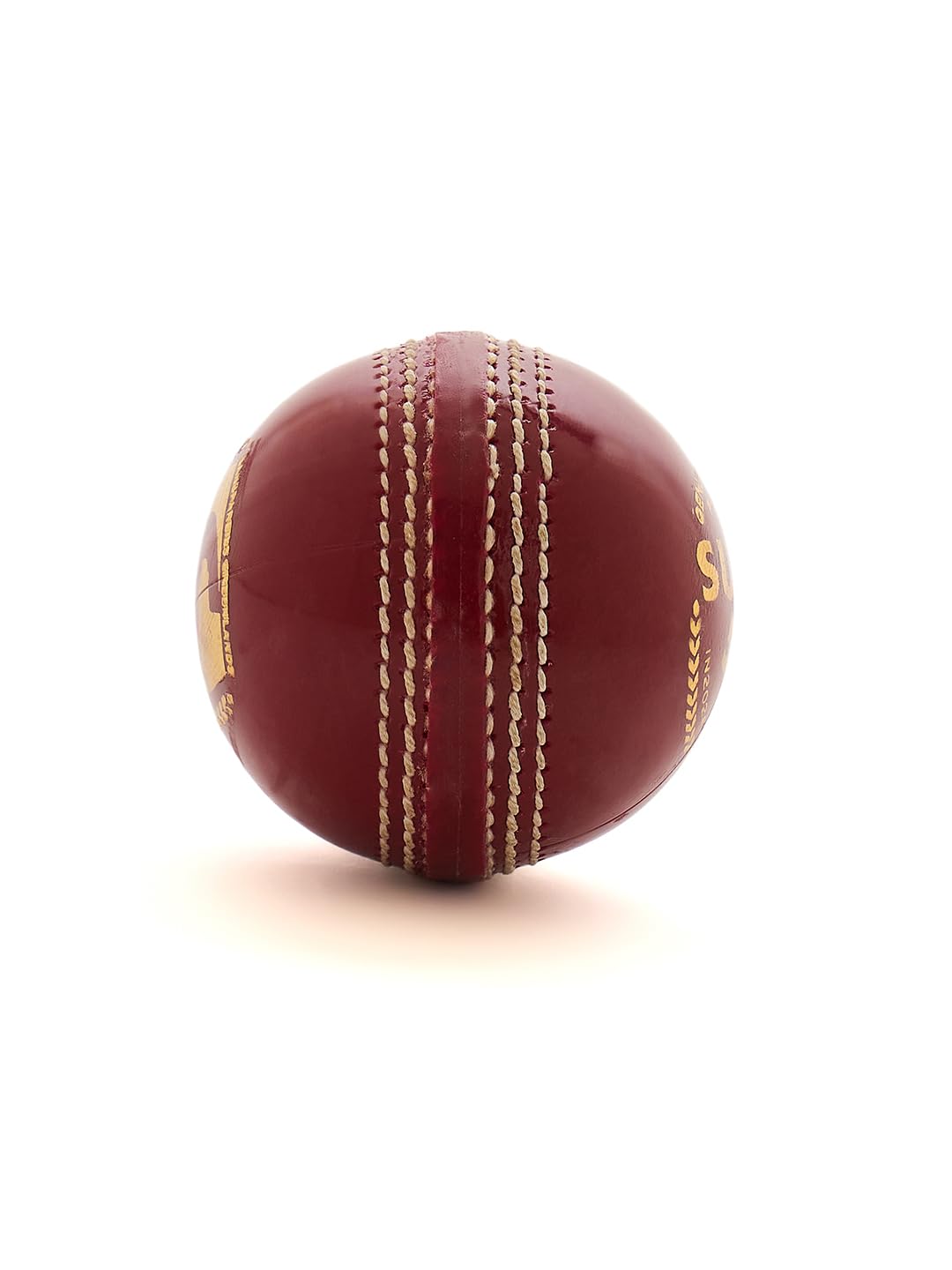 Professional red cricket ball used for bowling control and training drills