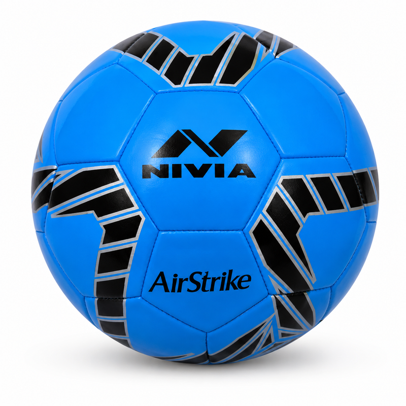 Nivia Airstrike football placed on grass pitch